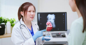 A female Nephrologist giving her patient Kidney care