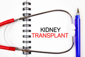 KIDNEY TRANSPLANT text on pad with stethoscope.